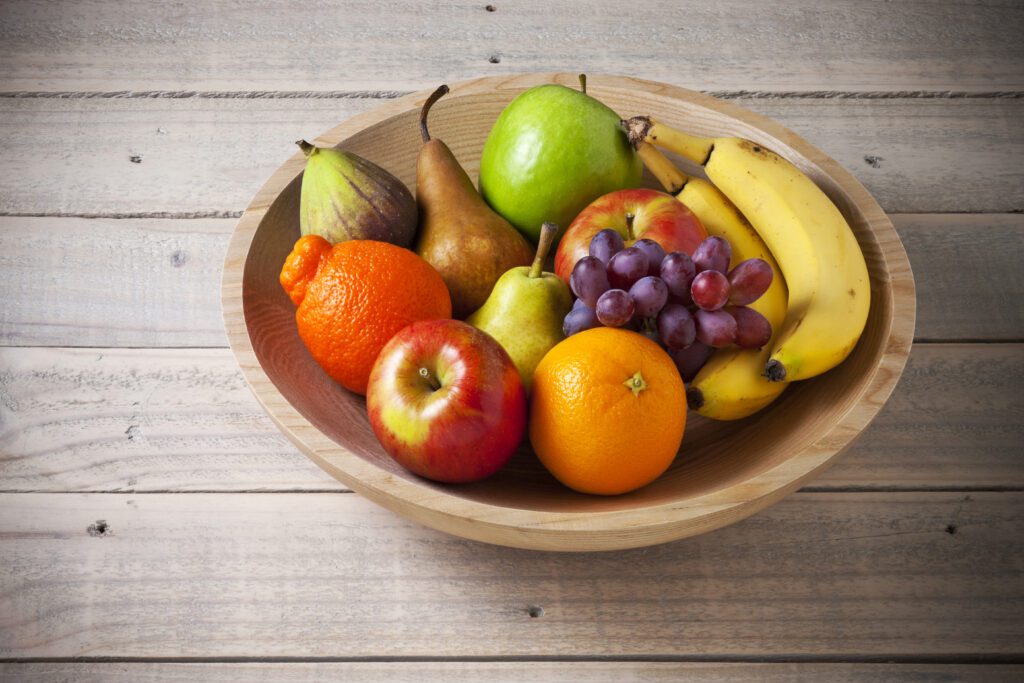 A fruit bowl on a counter